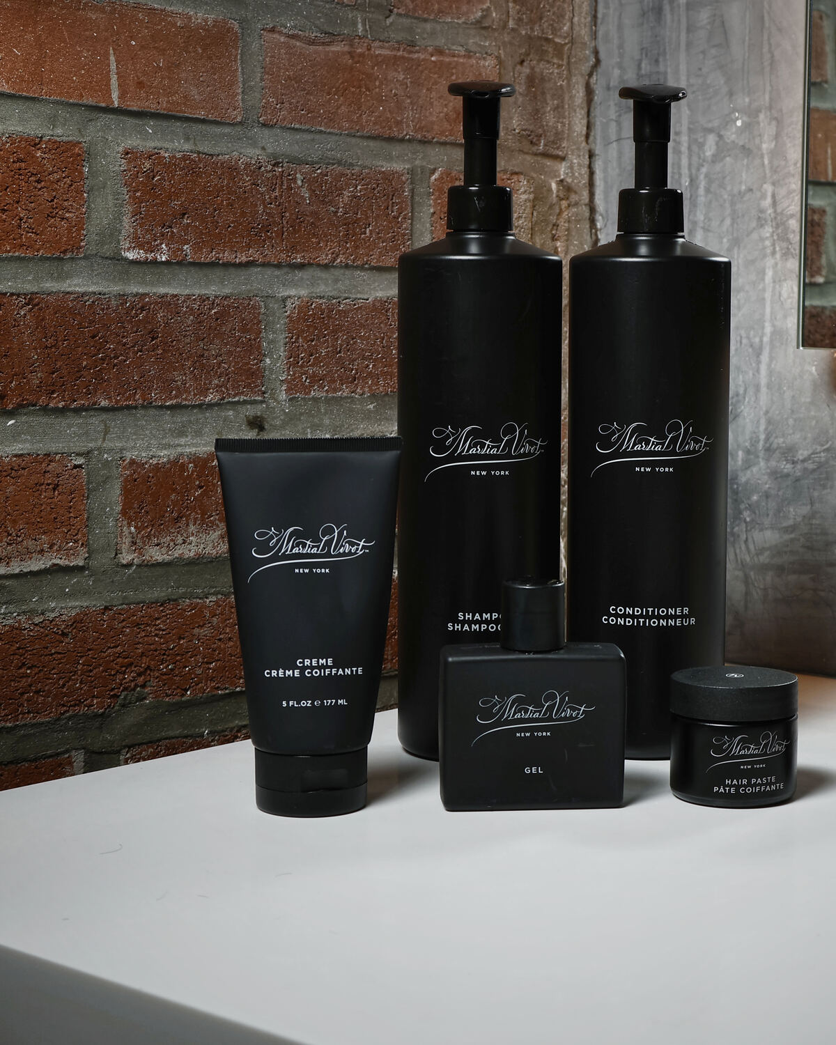 The Martial Vivot grooming line on a counter against the exposed brick