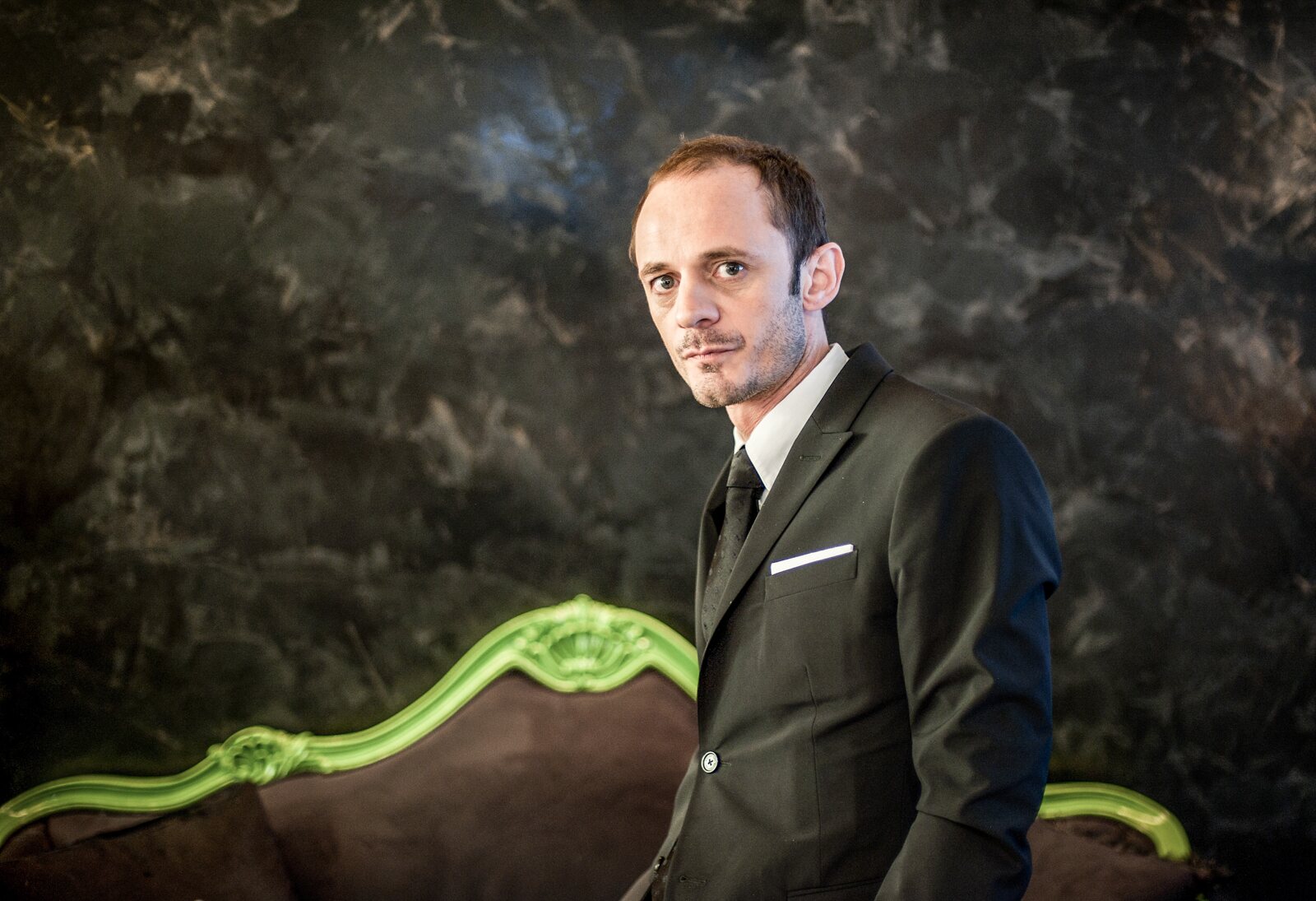 Martial Vivot, founder of Salon Pour Hommes, in a dark editorial portrait